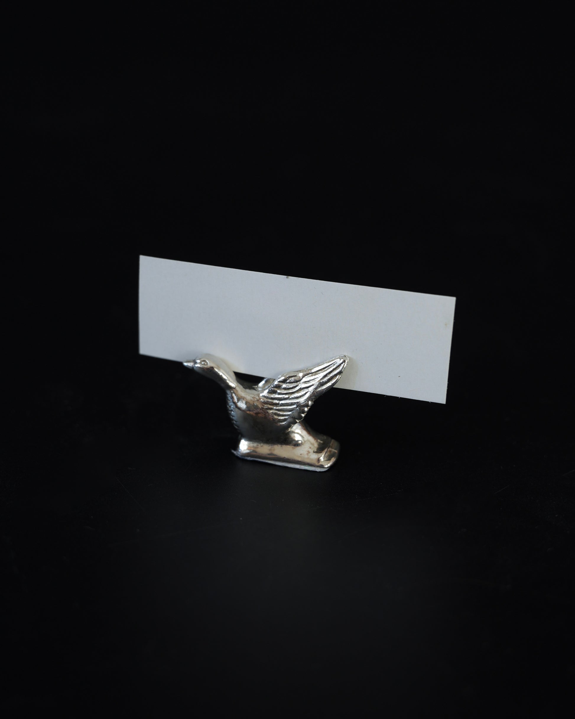 Chromowane uchwyty na winietki w kształcie ptaszków